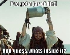 Captain Jack Sparrow holding a jar of dirt